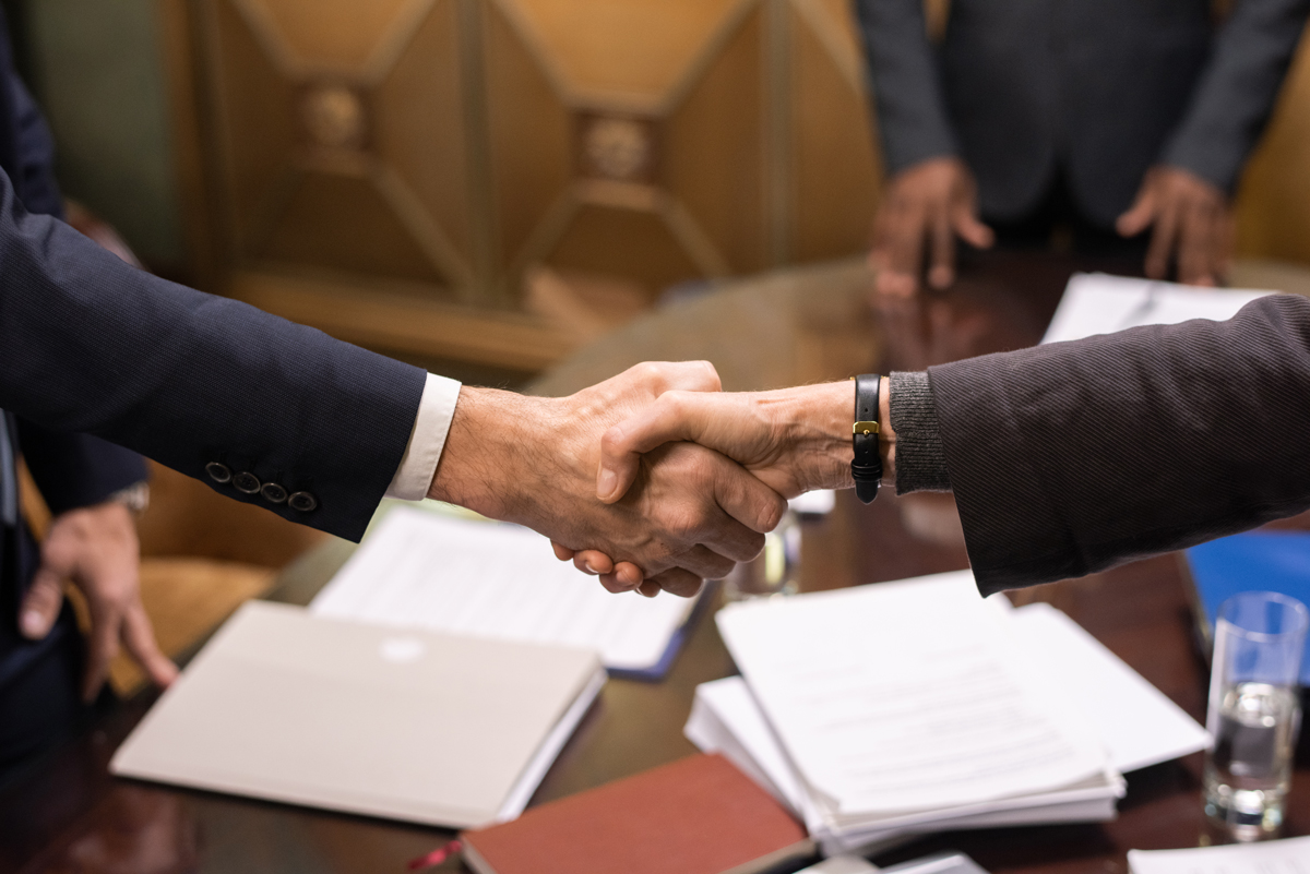 hands-of-two-successful-business-partners-handshake